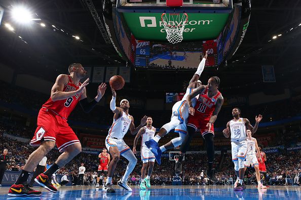 OKLAHOMA CITY, OK - NOVEMBER 22:  Shai Gilgeous-Alexander #2 of the Oklahoma City Thunder reaches for the ball during the game against the Chicago Bulls on November 22, 2023 at Paycom Arena in Oklahoma City, Oklahoma. NOTE TO USER: User expressly acknowledges and agrees that, by downloading and or using this photograph, User is consenting to the terms and conditions of the Getty Images License Agreement. Mandatory Copyright Notice: Copyright 2023 NBAE (Photo by Zach Beeker/NBAE via Getty Images)