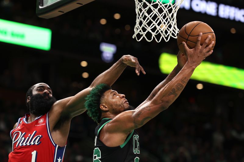 BOSTON, MASSACHUSETTS - MAY 01: James Harden #1 of the Philadelphia 76ers defends a shot from Marcus Smart #36 of the Boston Celtics during the second half in game one of the Eastern Conference Second Round Playoffs  at TD Garden on May 01, 2023 in Boston, Massachusetts. The 76ers defeat the Celtics 119-115. NOTE TO USER: User expressly acknowledges and agrees that, by downloading and or using this photograph, User is consenting to the terms and conditions of the Getty Images License Agreement.  (Photo by Maddie Meyer/Getty Images)