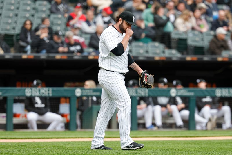May 4, 2025; Chicago, Illinois, USA; Chicago White Sox starting pitcher Bryse Wilson (46) reacts after giving up a two-run single hit by Houston Astros third baseman Mauricio Dubon during the second inning at Rate Field. Mandatory Credit: Kamil Krzaczynski-Imagn Images