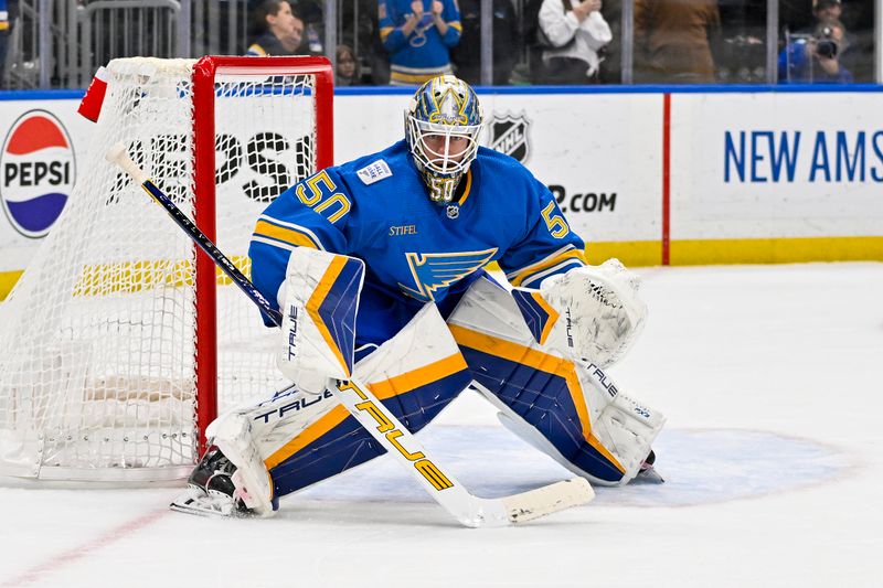 Jan 20, 2024; St. Louis, Missouri, USA;  St. Louis Blues goaltender Jordan Binnington (50) defends the net against the Washington Capitals during the third period at Enterprise Center. Mandatory Credit: Jeff Curry-USA TODAY Sports