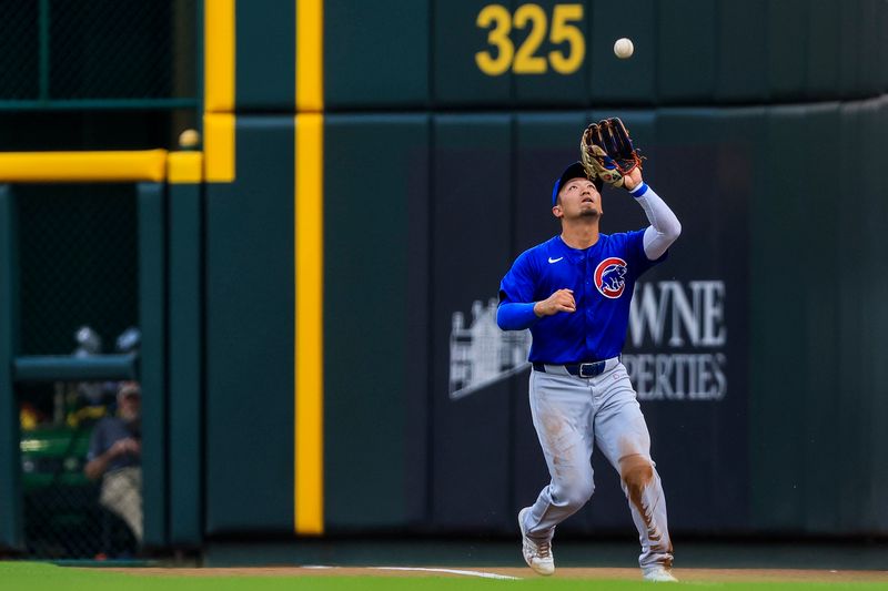 Jul 30, 2024; Cincinnati, Ohio, USA; Chicago Cubs outfielder Seiya Suzuki (27) catches a pop up hit by Cincinnati Reds outfielder Spencer Steer (not pictured) in the first inning at Great American Ball Park. Mandatory Credit: Katie Stratman-USA TODAY Sports