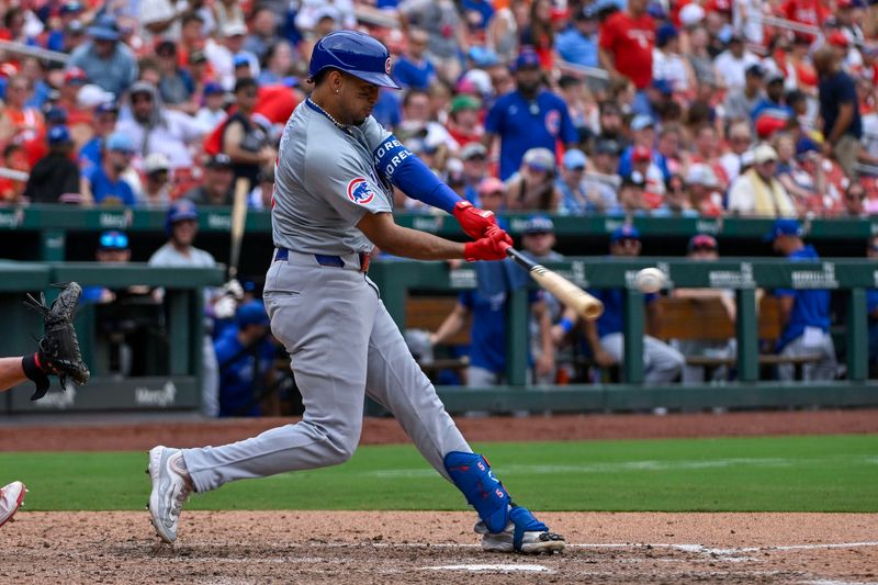 Jul 14, 2024; St. Louis, Missouri, USA;  Chicago Cubs designated hitter Christopher Morel (5) hits a solo home run against the St. Louis Cardinals during the eighth inning at Busch Stadium. Mandatory Credit: Jeff Curry-USA TODAY Sports