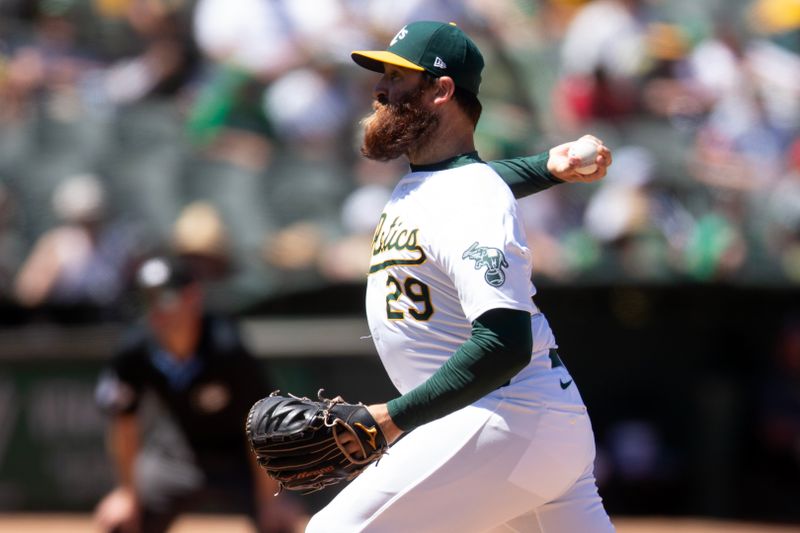 Jun 23, 2024; Oakland, California, USA; Oakland Athletics pitcher Austin Adams (29) delivers a pitch against the Minnesota Twins during the seventh inning at Oakland-Alameda County Coliseum. Mandatory Credit: D. Ross Cameron-USA TODAY Sports