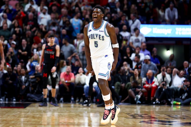 MIAMI, FLORIDA - DECEMBER 18: Anthony Edwards #5 of the Minnesota Timberwolves reacts during the fourth quarter of the game against the Miami Heat at Kaseya Center on December 18, 2023 in Miami, Florida. NOTE TO USER: User expressly acknowledges and agrees that, by downloading and or using this photograph, User is consenting to the terms and conditions of the Getty Images License Agreement. (Photo by Megan Briggs/Getty Images)