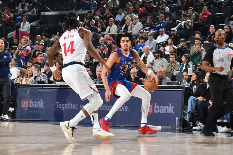 INGLEWOOD, CA - DECEMBER 1: Julian Strawther #3 of the Denver Nuggets dribbles the ball during the game against the LA Clippers on December 1, 2024 at Intuit Dome in Los Angeles, California. NOTE TO USER: User expressly acknowledges and agrees that, by downloading and/or using this Photograph, user is consenting to the terms and conditions of the Getty Images License Agreement. Mandatory Copyright Notice: Copyright 2024 NBAE (Photo by Juan Ocampo/NBAE via Getty Images)