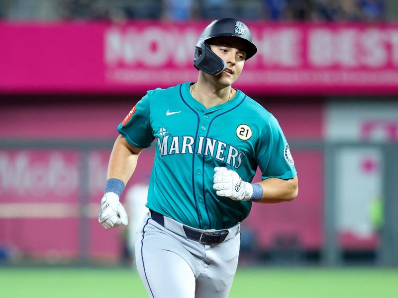 Sep 16, 2025; Kansas City, Missouri, USA; Seattle Mariners right fielder Dominic Canzone (8) rounds the bases after hitting his third home run of the night against the Kansas City Royals at Kauffman Stadium. Mandatory Credit: Scott Sewell-Imagn Images