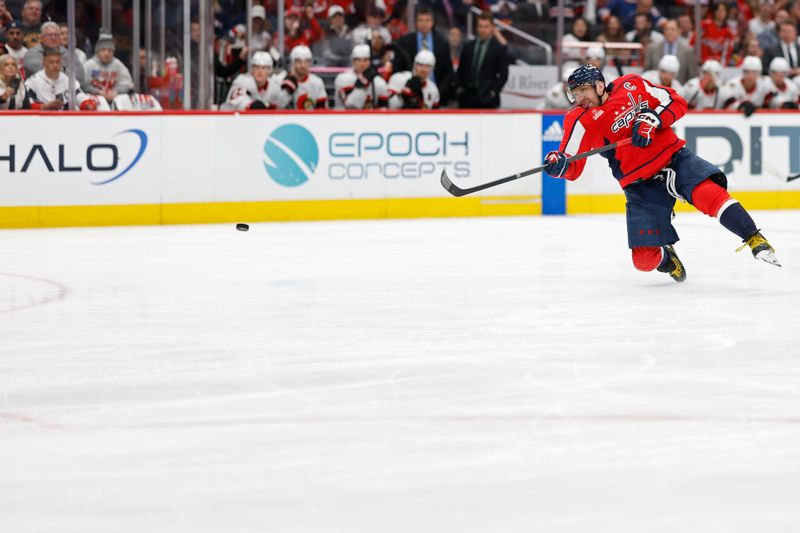 Apr 7, 2024; Washington, District of Columbia, USA; Washington Capitals left wing Alex Ovechkin (8) shoots the puck against the Ottawa Senators in the third period at Capital One Arena. Mandatory Credit: Geoff Burke-USA TODAY Sports