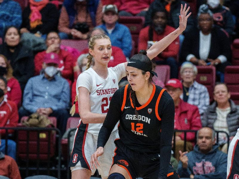 Jan 27, 2023; Stanford, California, USA; Oregon State Beavers forward Jelena Mitrovic (12) is guarded by Stanford Cardinal forward Cameron Brink (22) during the first quarter at Maples Pavilion. Mandatory Credit: Neville E. Guard-USA TODAY Sports