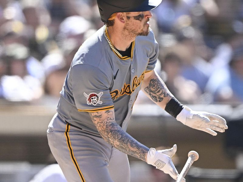 August 14, 2024; San Diego, California, USA; Pittsburgh Pirates catcher Yasmani Grandal (6) hits a single against the San Diego Padres during the ninth inning at Petco Park. Mandatory Credit: Denis Poroy-USA TODAY Sports at Petco Park. 