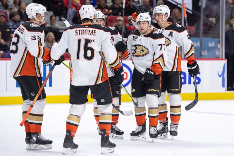 Feb 15, 2024; Ottawa, Ontario, CAN; The Anaheim Ducks celebrate a goal scored by right wing Frank Vatrano (77) in the third period against the Ottawa Senators at the Canadian Tire Centre. Mandatory Credit: Marc DesRosiers-USA TODAY Sports