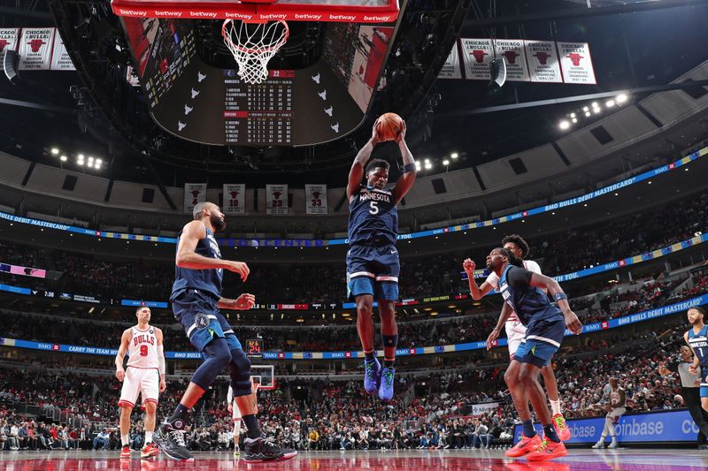 CHICAGO, IL - FEBRUARY 6: Anthony Edwards #5 of the Minnesota Timberwolves rebounds during the game against the Chicago Bulls on February 6, 2024 at United Center in Chicago, Illinois. NOTE TO USER: User expressly acknowledges and agrees that, by downloading and or using this photograph, User is consenting to the terms and conditions of the Getty Images License Agreement. Mandatory Copyright Notice: Copyright 2024 NBAE (Photo by Jeff Haynes/NBAE via Getty Images)