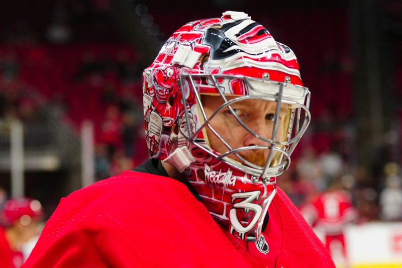 Oct 26, 2023; Raleigh, North Carolina, USA; Carolina Hurricanes goaltender Frederik Andersen (31) looks on before the game against the Seattle Kraken at PNC Arena. Mandatory Credit: James Guillory-USA TODAY Sports