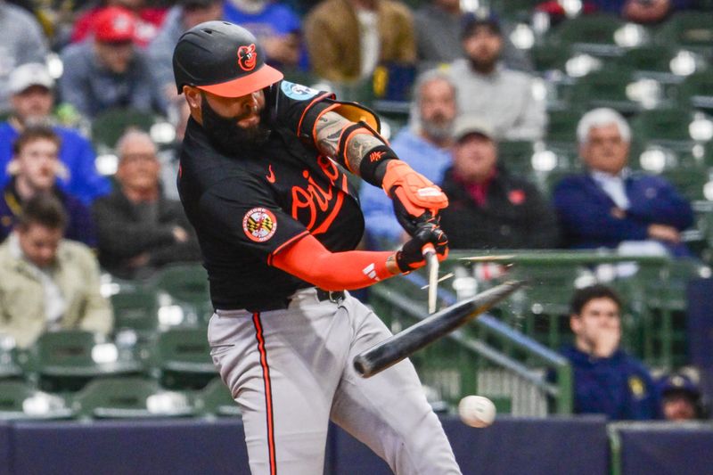 May 21, 2025; Milwaukee, Wisconsin, USA; Baltimore Orioles third baseman Emmanuel Rivera (26) breaks his bat while grounding out in the tenth inning against the Milwaukee Brewers at American Family Field. Mandatory Credit: Benny Sieu-Imagn Images