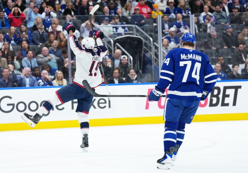 Nov 20, 2025; Toronto, Ontario, CAN; Columbus Blue Jackets center Adam Fantilli (19) celebrates scoring a goal against the Toronto Maple Leafs during the second period at Scotiabank Arena. Mandatory Credit: Nick Turchiaro-Imagn Images