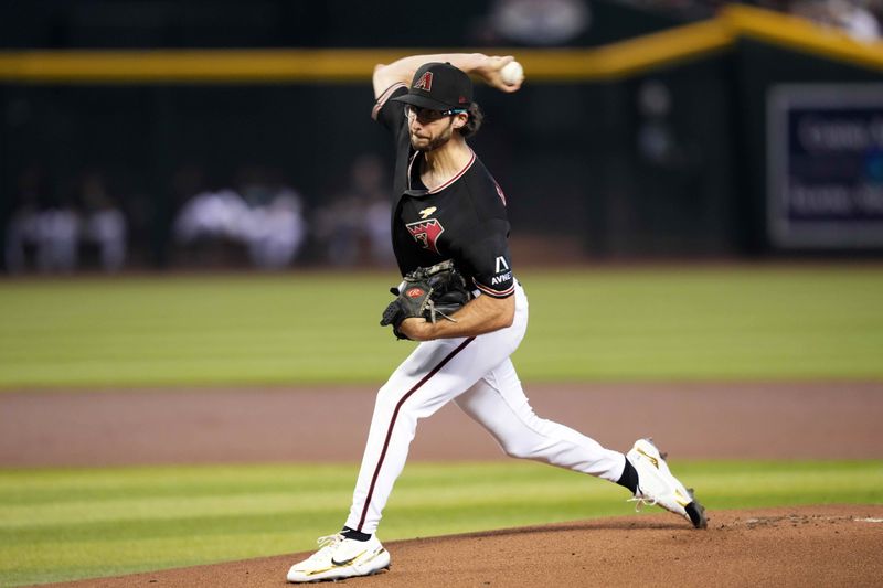 Sep 3, 2023; Phoenix, Arizona, USA; Arizona Diamondbacks starting pitcher Zac Gallen (23) pitches against the Baltimore Orioles during the first inning at Chase Field. Mandatory Credit: Joe Camporeale-USA TODAY Sports