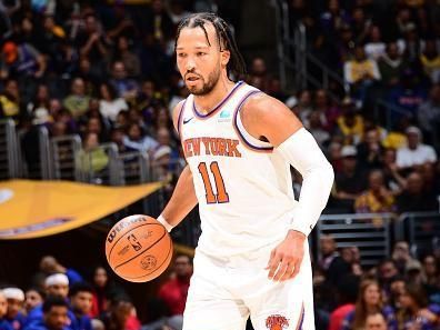 LOS ANGELES, CA - DECEMBER 18:  Jalen Brunson #11 of the New York Knicks handles the ball during the game   on December 18, 2023 at Crypto.Com Arena in Los Angeles, California. NOTE TO USER: User expressly acknowledges and agrees that, by downloading and/or using this Photograph, user is consenting to the terms and conditions of the Getty Images License Agreement. Mandatory Copyright Notice: Copyright 2023 NBAE (Photo by Adam Pantozzi/NBAE via Getty Images)