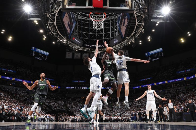 MINNEAPOLIS, MN - MAY 30: Anthony Edwards #5 of the Minnesota Timberwolves drives to the basket during the game against the Dallas Mavericks during Round 3 Game 5 of the 2024 NBA Playoffs on May 30, 2024 at Target Center in Minneapolis, Minnesota. NOTE TO USER: User expressly acknowledges and agrees that, by downloading and or using this Photograph, user is consenting to the terms and conditions of the Getty Images License Agreement. Mandatory Copyright Notice: Copyright 2024 NBAE (Photo by Joe Murphy/NBAE via Getty Images)