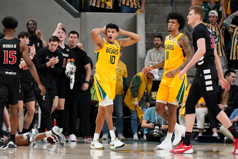 Jan 13, 2024; Waco, Texas, USA; Baylor Bears guard RayJ Dennis (10) reacts to a foul call during the second half against the Cincinnati Bearcats at Paul and Alejandra Foster Pavilion. Mandatory Credit: Raymond Carlin III-USA TODAY Sports