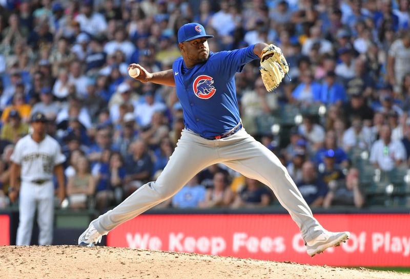 Jun 29, 2024; Milwaukee, Wisconsin, USA; Chicago Cubs pitcher Héctor Neris (51) delivers a pitch against the Milwaukee Brewers in the ninth inning at American Family Field. Mandatory Credit: Michael McLoone-USA TODAY Sports