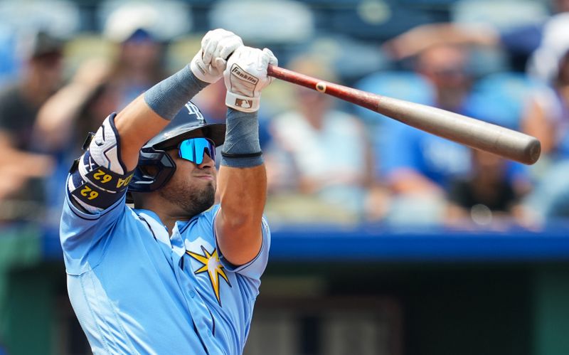 Jul 15, 2023; Kansas City, Missouri, USA; Tampa Bay Rays designated hitter Jonathan Aranda (62) swings at a pitch during the sixth inning against the Kansas City Royals at Kauffman Stadium. Mandatory Credit: Jay Biggerstaff-USA TODAY Sports