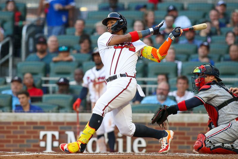 Jun 27, 2023; Atlanta, Georgia, USA; Atlanta Braves right fielder Ronald Acuna Jr. (13) hits a home run against the Minnesota Twins in the second inning at Truist Park. Mandatory Credit: Brett Davis-USA TODAY Sports
