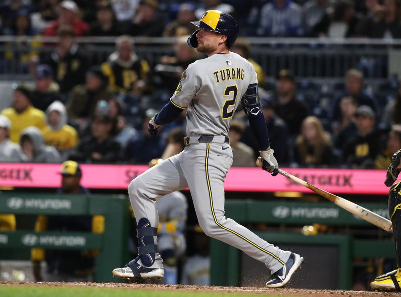 May 23, 2025; Pittsburgh, Pennsylvania, USA;  Milwaukee Brewers second baseman Brice Turang (2) hits an RBI single against the Pittsburgh Pirates during the seventh inning at PNC Park. Mandatory Credit: Charles LeClaire-Imagn Images