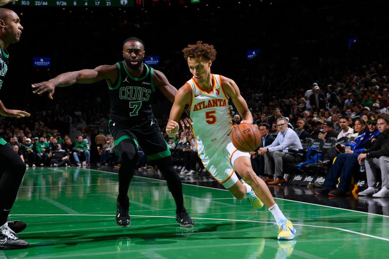 BOSTON, MA - NOVEMBER 12: Dyson Daniels #5 of the Atlanta Hawks drives to the basket during the game against the Boston Celtics during the Emirates NBA Cup game on November 12, 2024 at TD Garden in Boston, Massachusetts. NOTE TO USER: User expressly acknowledges and agrees that, by downloading and/or using this Photograph, user is consenting to the terms and conditions of the Getty Images License Agreement. Mandatory Copyright Notice: Copyright 2024 NBAE (Photo by Brian Babineau/NBAE via Getty Images)