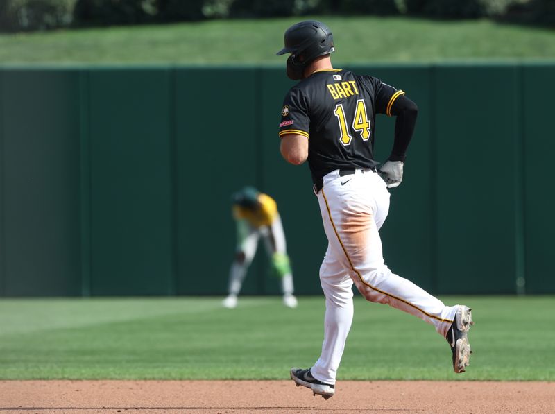 Sep 21, 2025; Pittsburgh, Pennsylvania, USA;  Pittsburgh Pirates catcher Joey Bart (14) circles the bases on a three run hime run against the Athletics during the fifth inning at PNC Park. Mandatory Credit: Charles LeClaire-Imagn Images