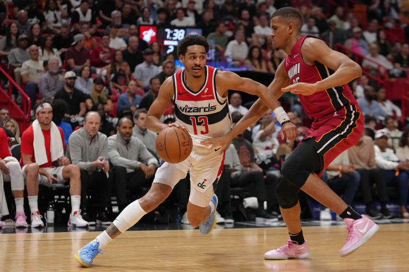 MIAMI, FL - MARCH 10: Jordan Poole #13 of the Washington Wizards handles the ball during the game against the Miami Heat on March 10, 2024 at Kaseya Center in Miami, Florida. NOTE TO USER: User expressly acknowledges and agrees that, by downloading and or using this Photograph, user is consenting to the terms and conditions of the Getty Images License Agreement. Mandatory Copyright Notice: Copyright 2024 NBAE (Photo by Eric Espada/NBAE via Getty Images)