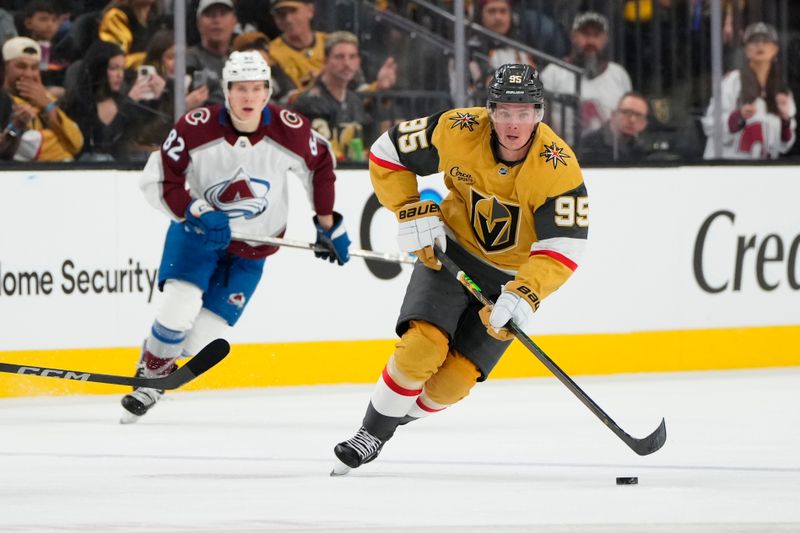 Oct 9, 2024; Las Vegas, Nevada, USA; Vegas Golden Knights right wing Victor Olofsson (95) skates with the puck against Colorado Avalanche center Ivan Ivan (82) during the second period at T-Mobile Arena. Mandatory Credit: Lucas Peltier-Imagn Images