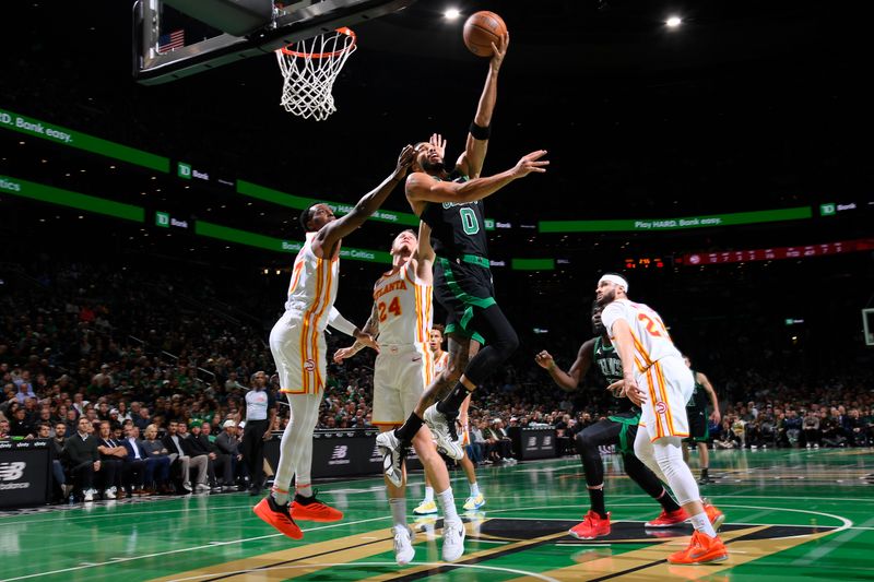 BOSTON, MA - NOVEMBER 12: Jayson Tatum #0 of the Boston Celtics drives to the basket during the game against the Atlanta Hawks during the Emirates NBA Cup game on November 12, 2024 at TD Garden in Boston, Massachusetts. NOTE TO USER: User expressly acknowledges and agrees that, by downloading and/or using this Photograph, user is consenting to the terms and conditions of the Getty Images License Agreement. Mandatory Copyright Notice: Copyright 2024 NBAE (Photo by Brian Babineau/NBAE via Getty Images)