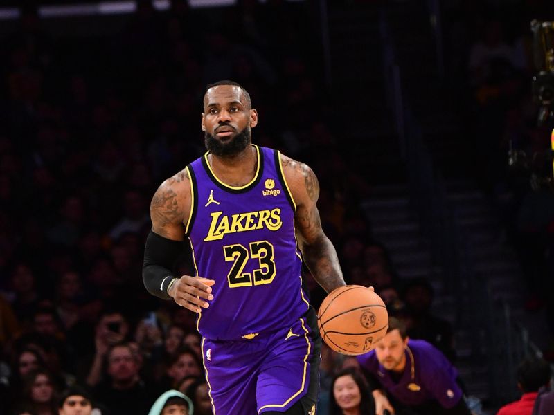 LOS ANGELES, CA - FEBRUARY 9:  LeBron James #23 of the Los Angeles Lakers handles the ball during the game against the New Orleans Pelicans on February 9, 2024 at Crypto.Com Arena in Los Angeles, California. NOTE TO USER: User expressly acknowledges and agrees that, by downloading and/or using this Photograph, user is consenting to the terms and conditions of the Getty Images License Agreement. Mandatory Copyright Notice: Copyright 2024 NBAE (Photo by Adam Pantozzi/NBAE via Getty Images)