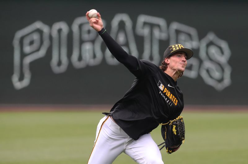 Jun 5, 2025; Pittsburgh, Pennsylvania, USA;  Pittsburgh Pirates relief pitcher Kyle Nicolas (66) throws in the outfield before the game against the Houston Astros at PNC Park. Mandatory Credit: Charles LeClaire-Imagn Images