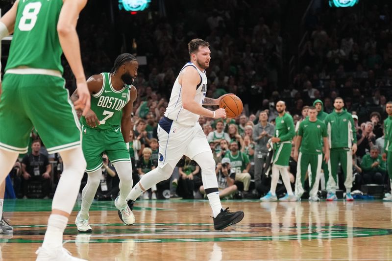 BOSTON, MA - JUNE 17: Luka Doncic #77 of the Dallas Mavericks dribbles the ball during the game against the Boston Celtics during Game 5 of the 2024 NBA Finals on June 17, 2024 at the TD Garden in Boston, Massachusetts. NOTE TO USER: User expressly acknowledges and agrees that, by downloading and or using this photograph, User is consenting to the terms and conditions of the Getty Images License Agreement. Mandatory Copyright Notice: Copyright 2024 NBAE  (Photo by Jesse D. Garrabrant/NBAE via Getty Images)
