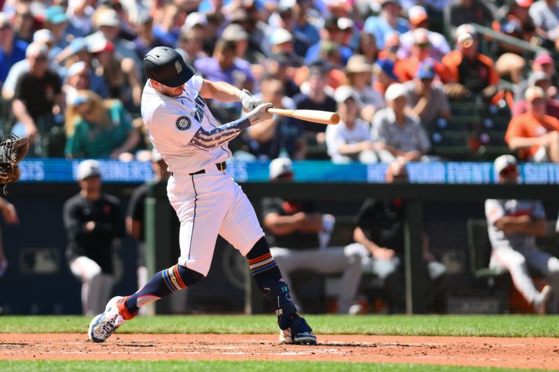 Jul 4, 2024; Seattle, Washington, USA; Seattle Mariners designated hitter Mitch Garver (18) hits a home run against the Baltimore Orioles during the seventh inning at T-Mobile Park. Mandatory Credit: Steven Bisig-USA TODAY Sports