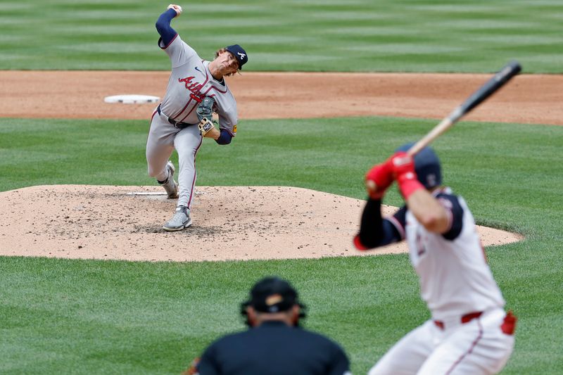 Jun 9, 2024; Washington, District of Columbia, USA; Atlanta Braves starting pitcher Hurston Waldrep (30) pitches against Washington Nationals first baseman Joey Gallo (24) during the third inning at Nationals Park. Mandatory Credit: Geoff Burke-USA TODAY Sports