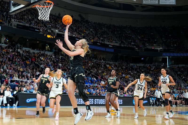 Mar 30, 2024; Albany, NY, USA; Colorado Buffaloes guard Maddie Nolan (24) shoots the ball against the Iowa Hawkeyes in the semifinals of the Albany Regional of the 2024 NCAA Tournament at the MVP Arena. Mandatory Credit: Gregory Fisher-USA TODAY Sports