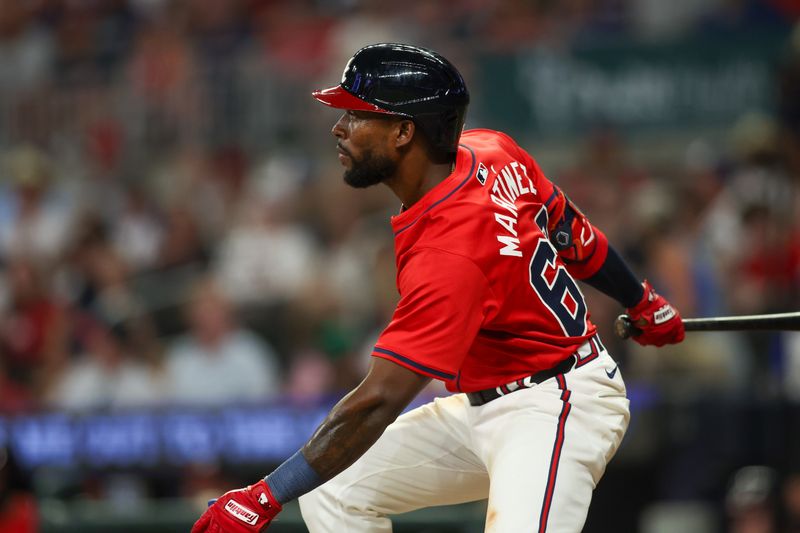 Jun 14, 2024; Atlanta, Georgia, USA; Atlanta Braves center fielder J.P. Martinez (63) reaches on an error against the Tampa Bay Rays in the eighth inning at Truist Park. Mandatory Credit: Brett Davis-USA TODAY Sports
