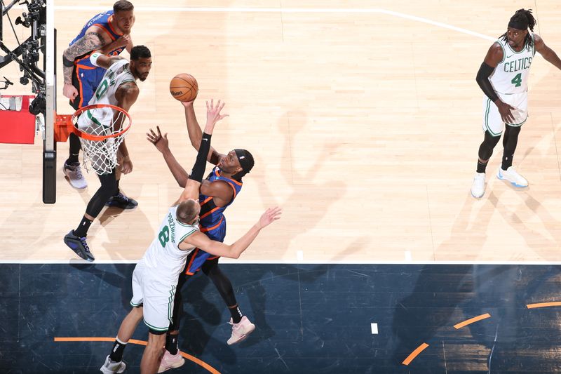 NEW YORK, NY - FEBRUARY 24: Precious Achiuwa #5 of the New York Knicks drives to the basket during the game against the Boston Celtics on February 24, 2024 at Madison Square Garden in New York City, New York.  NOTE TO USER: User expressly acknowledges and agrees that, by downloading and or using this photograph, User is consenting to the terms and conditions of the Getty Images License Agreement. Mandatory Copyright Notice: Copyright 2024 NBAE  (Photo by Nathaniel S. Butler/NBAE via Getty Images)