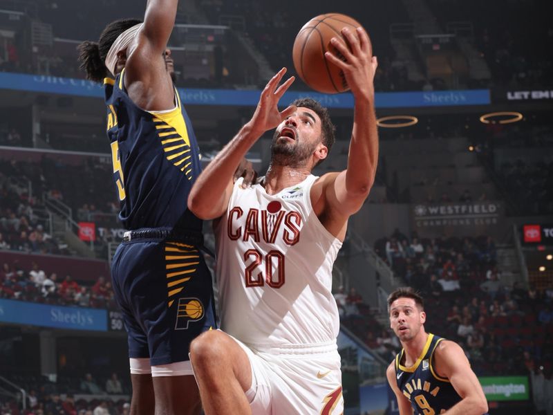 Cleveland, OH - OCTOBER 10: Georges Niang #20 of the Cleveland Cavaliers shoots the ball during the game against the Indiana Pacers during a NBA pre season game on October 10, 2024 at Rocket Mortgage Fieldhouse in Cleveland, Ohio. NOTE TO USER: User expressly acknowledges and agrees that, by downloading and or using this photograph, User is consenting to the terms and conditions of the Getty Images License Agreement. Mandatory Copyright Notice: Copyright 2024 NBAE (Photo by Jeff Haynes/NBAE via Getty Images)