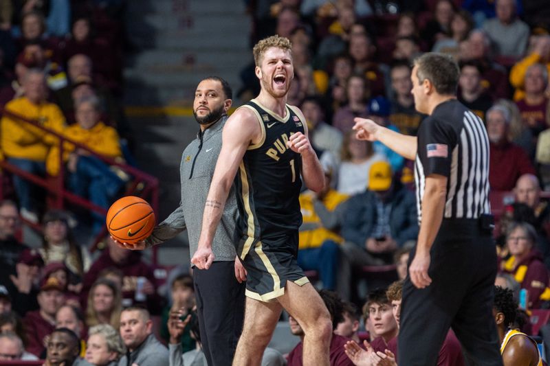 Jan 19, 2023; Minneapolis, Minnesota, USA; Purdue Boilermakers forward Caleb Furst (1) celebrates in front of Minnesota Golden Gophers head coach Ben Johnson after a foul is called in the second half at Williams Arena. Mandatory Credit: Matt Blewett-USA TODAY Sports