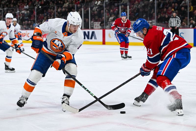 Dec 3, 2024; Montreal, Quebec, CAN; New York Islanders right wing Maxim Tsyplakov (7) plays the puck against Montreal Canadiens defenseman Kaiden Guhle (21) during the second period at Bell Centre. Mandatory Credit: David Kirouac-Imagn Images