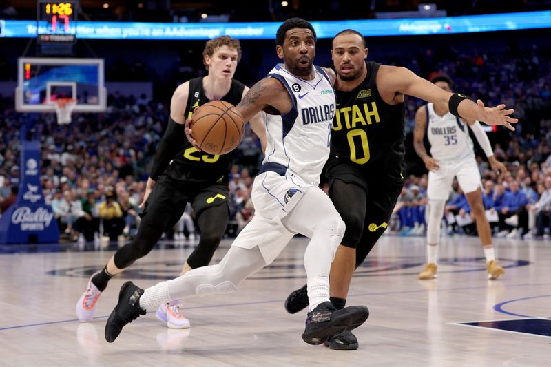 DALLAS, TEXAS - MARCH 07: Kyrie Irving #2 of the Dallas Mavericks drives to the basket against Talen Horton-Tucker #0 of the Utah Jazz in the second quarter at American Airlines Center on March 07, 2023 in Dallas, Texas. (Photo by Tom Pennington/Getty Images)