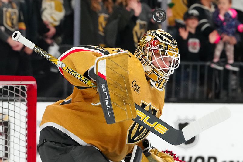 Feb 20, 2024; Las Vegas, Nevada, USA; Vegas Golden Knights goaltender Adin Hill (33) warms up before a game against the Nashville Predators at T-Mobile Arena. Mandatory Credit: Stephen R. Sylvanie-USA TODAY Sports