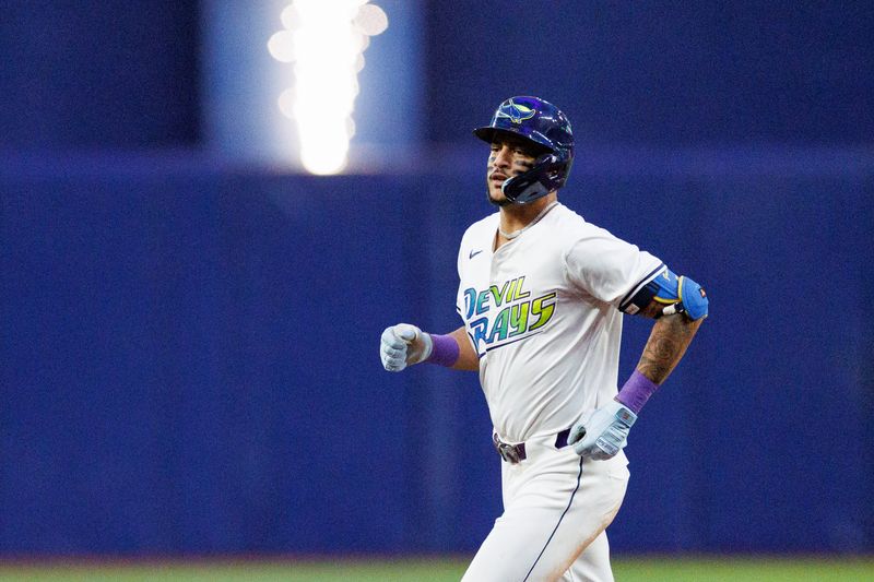 Jun 28, 2024; St. Petersburg, Florida, USA;  Tampa Bay Rays outfielder Jose Siri (22) runs the bases after hitting a home run against the Washington Nationals in the sixth inning at Tropicana Field. Mandatory Credit: Nathan Ray Seebeck-USA TODAY Sports