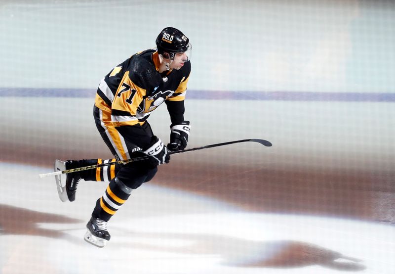 Jan 27, 2024; Pittsburgh, Pennsylvania, USA;  Pittsburgh Penguins center Evgeni Malkin (71) takes the ice against the Montreal Canadiens at PPG Paints Arena. The Penguins won 3-2 in overtime. Mandatory Credit: Charles LeClaire-USA TODAY Sports