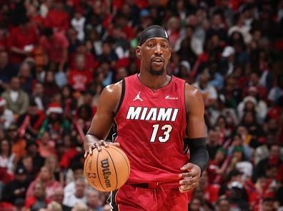 MIAMI, FL - DECEMBER 25:  Bam Adebayo #13 of the Miami Heat handles the ball during the game against the Philadelphia 76ers on December 25, 2023 at Kaseya Center in Miami, Florida. NOTE TO USER: User expressly acknowledges and agrees that, by downloading and or using this Photograph, user is consenting to the terms and conditions of the Getty Images License Agreement. Mandatory Copyright Notice: Copyright 2023 NBAE (Photo by David Sherman/NBAE via Getty Images)