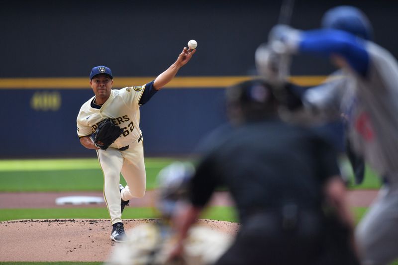Jul 9, 2025; Milwaukee, Wisconsin, USA; Milwaukee Brewers starting pitcher Jose Quintana (62) pitches during the first inning against the Los Angeles Dodgers at American Family Field. Mandatory Credit: Patrick Gorski-Imagn Images