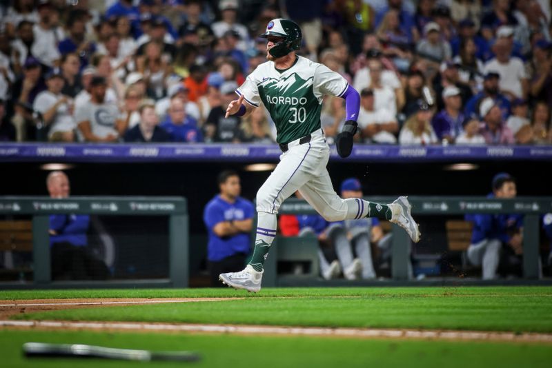 Sep 14, 2024; Denver, Colorado, USA; Colorado Rockies third base Aaron Schunk (30) runs to home during the game against the Chicago Cubs at Coors Field. Mandatory Credit: Chet Strange-Imagn Images