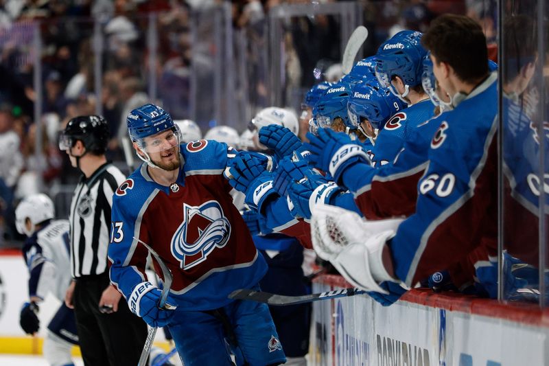 Apr 26, 2024; Denver, Colorado, USA; Colorado Avalanche right wing Valeri Nichushkin (13) celebrates with the bench after his goal in the third period against the Winnipeg Jets in game three of the first round of the 2024 Stanley Cup Playoffs at Ball Arena. Mandatory Credit: Isaiah J. Downing-USA TODAY Sports